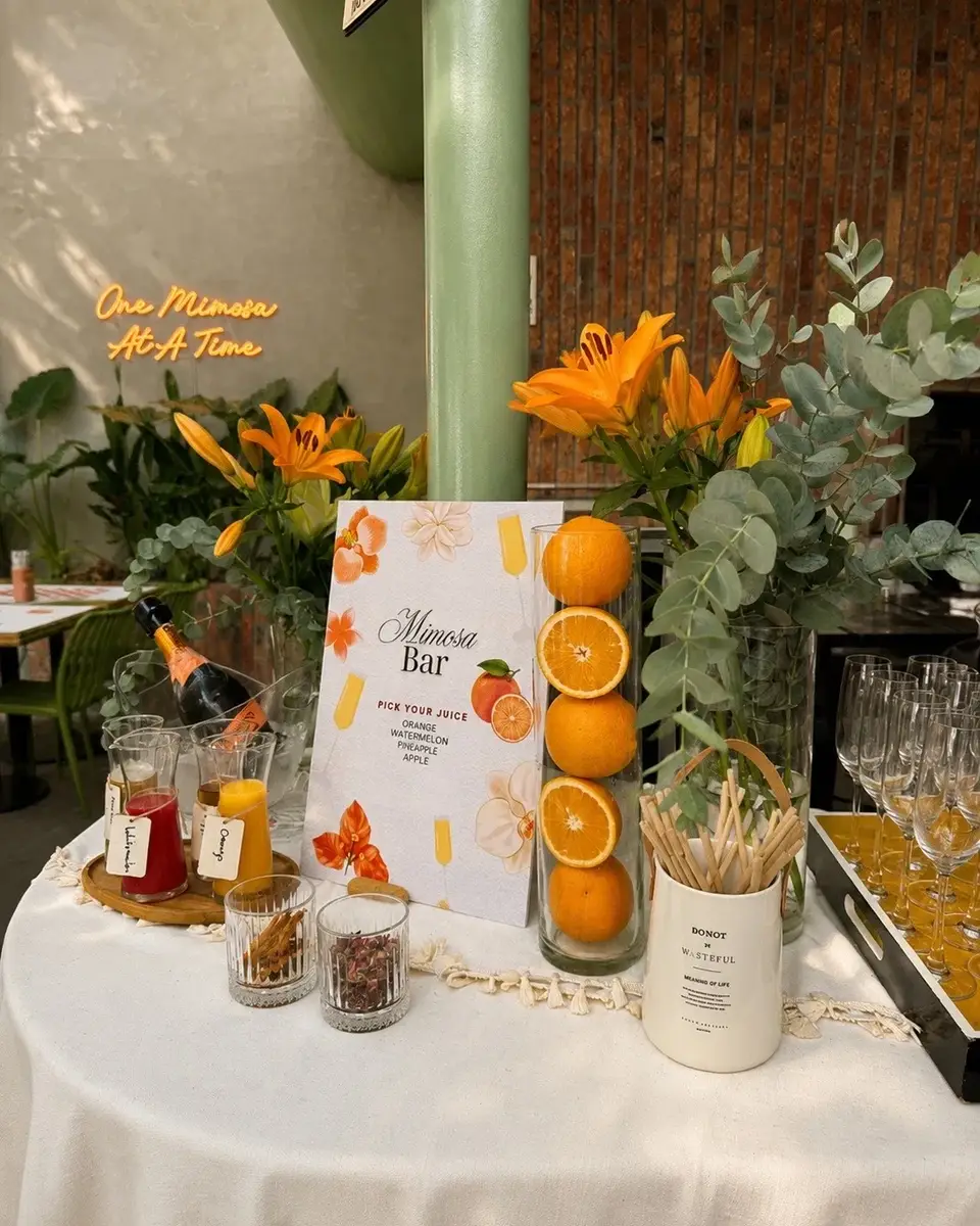 Bottomless mimosa station at Au Patio Thảo Điền