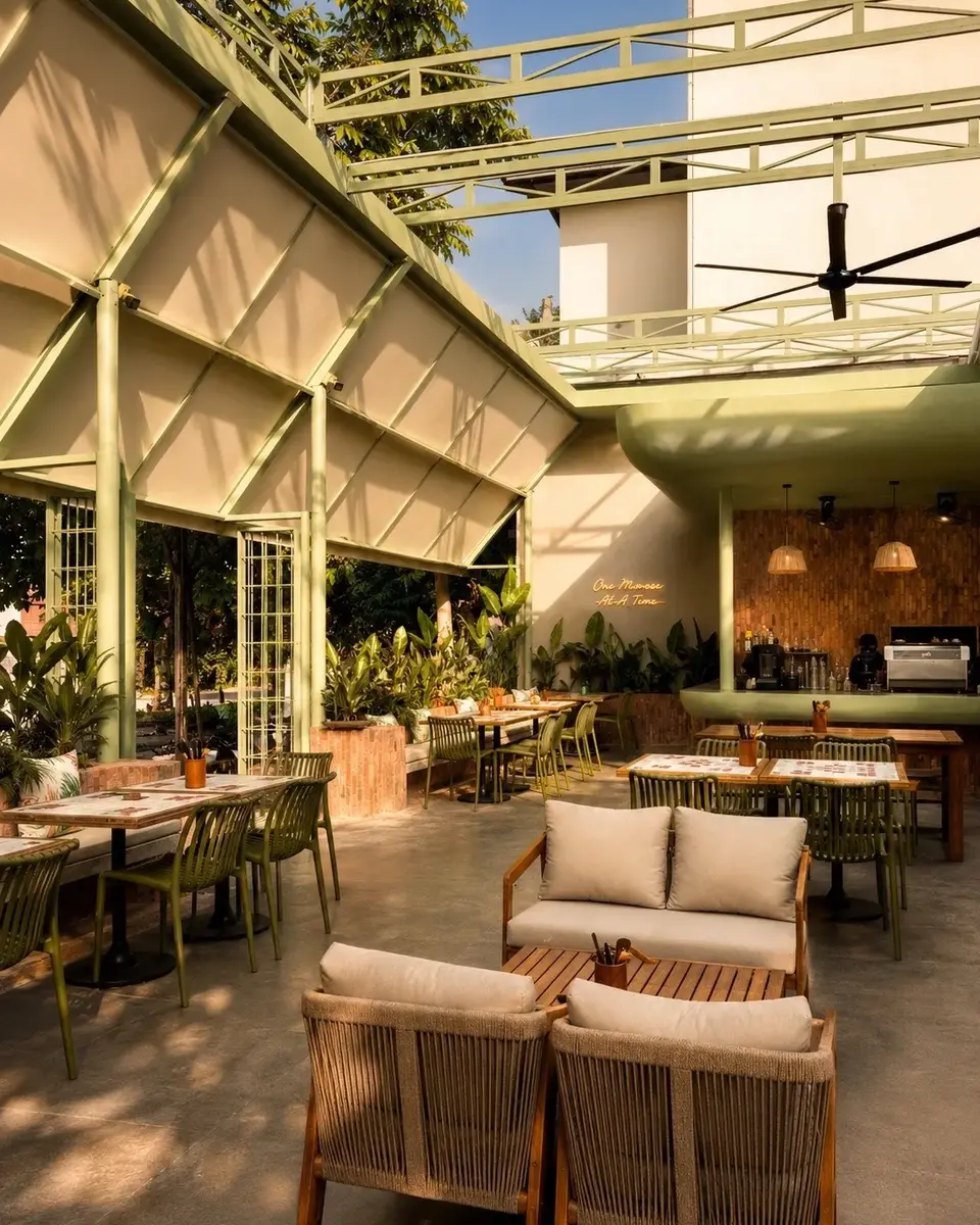 Covered patio tables and seating at Au Patio Thảo Điền