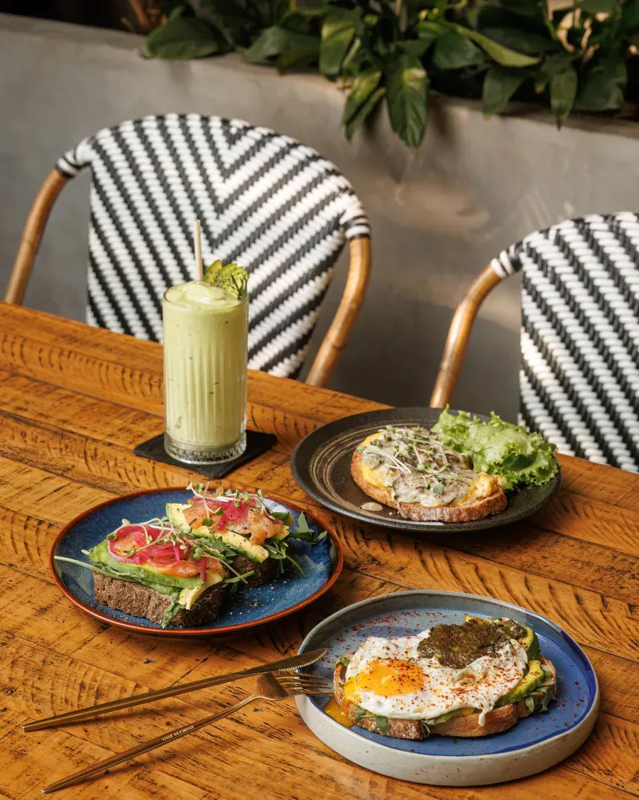 A brunch table with food and drinks at Au Patio